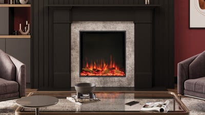 Square electric fireplace with realistic flame set in marble surround and dark mantel in elegant lounge room